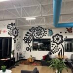 large scale mural painting in Joliet Illinois on interior wall featuring butterflies