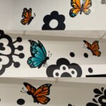 large scale mural painting in Joliet Illinois on interior wall featuring butterflies